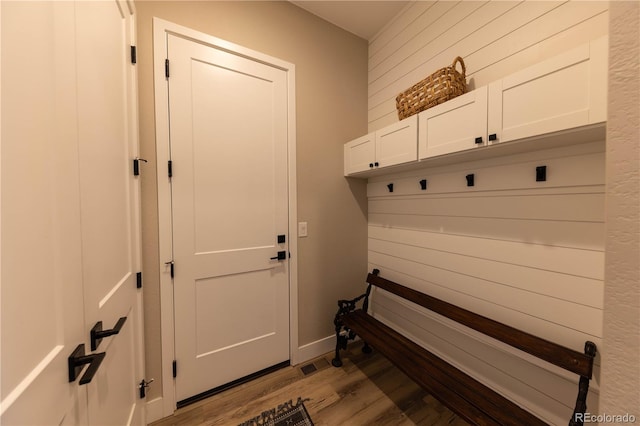 mudroom with light wood-style flooring