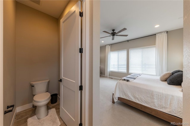 bedroom featuring a ceiling fan, recessed lighting, and baseboards