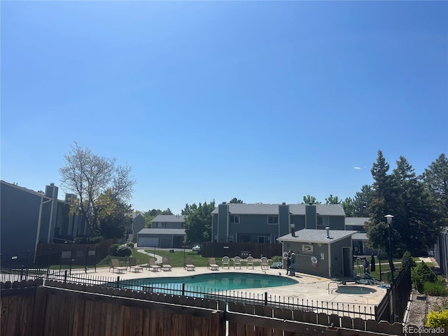 8771 Carr Loop, Arvada, CO 80005 - community pool with a patio area
