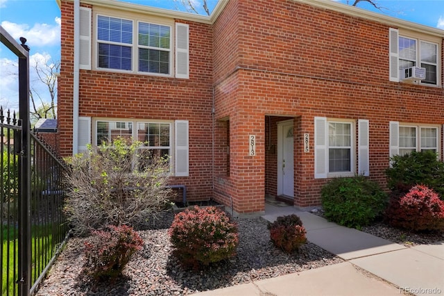 2813 Jasmine St, Denver, CO 80207 - view of front of home featuring brick siding and fence