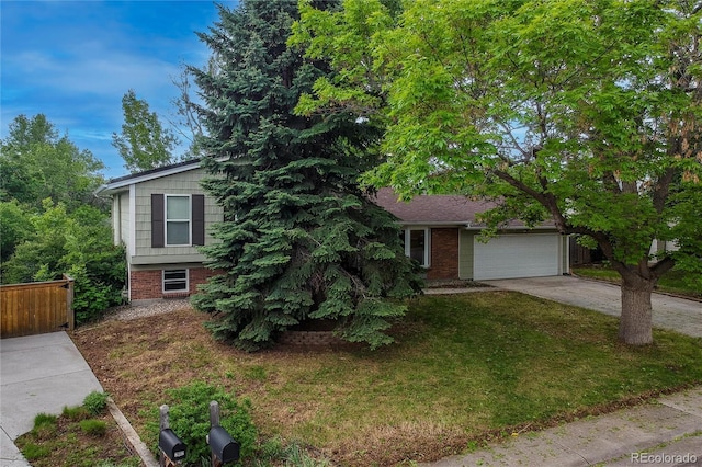 117 Sandler Dr, Lafayette, CO 80026 - split level home with brick siding, driveway, and an attached garage