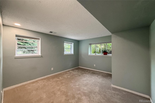 117 Sandler Dr, Lafayette, CO 80026 - carpeted spare room with baseboards and a textured ceiling