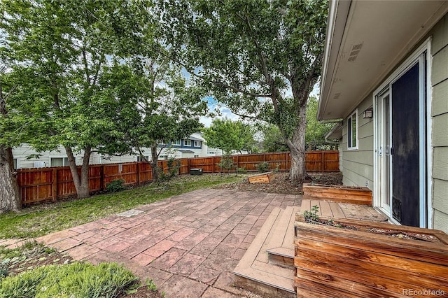 117 Sandler Dr, Lafayette, CO 80026 - fenced backyard featuring a patio area