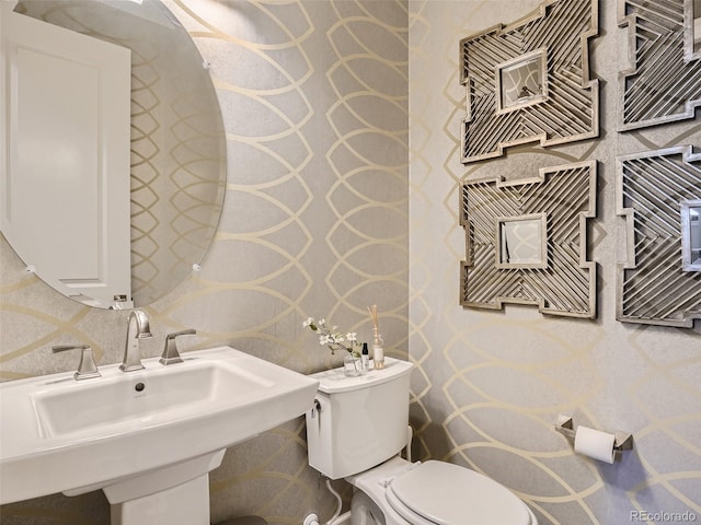 11096 Endeavor Dr, Parker, CO 80134 - half bath with toilet and a sink