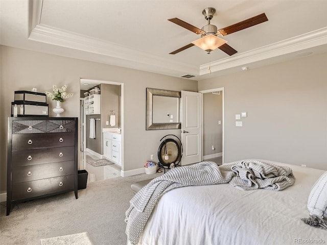 11096 Endeavor Dr, Parker, CO 80134 - bedroom with a tray ceiling, crown molding, carpet flooring, baseboards, and ensuite bathroom