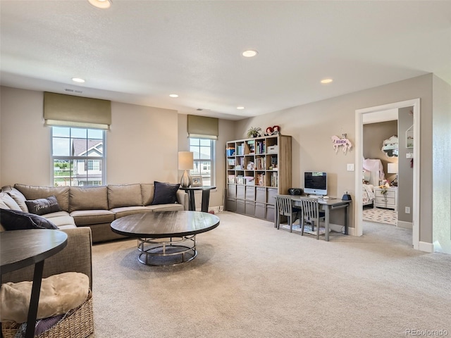 11096 Endeavor Dr, Parker, CO 80134 - carpeted living area featuring recessed lighting, an office area, and baseboards