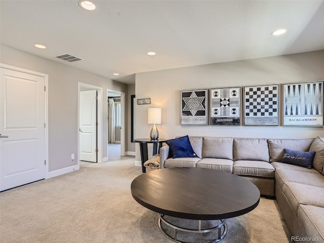11096 Endeavor Dr, Parker, CO 80134 - living room featuring light colored carpet, recessed lighting, and baseboards