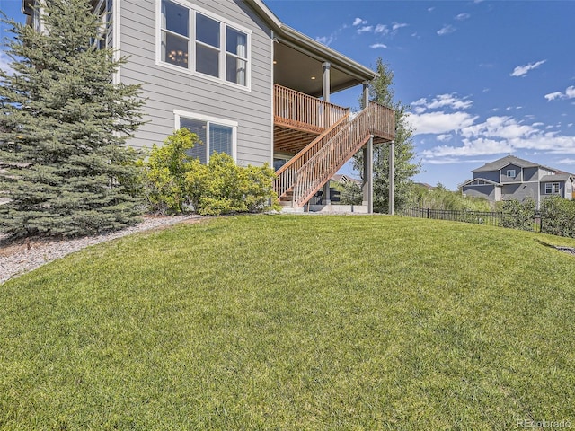 11096 Endeavor Dr, Parker, CO 80134 - back of house with stairs and a wooden deck