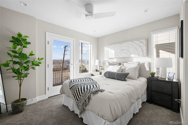 bedroom featuring access to outside, a ceiling fan, baseboards, and carpet floors