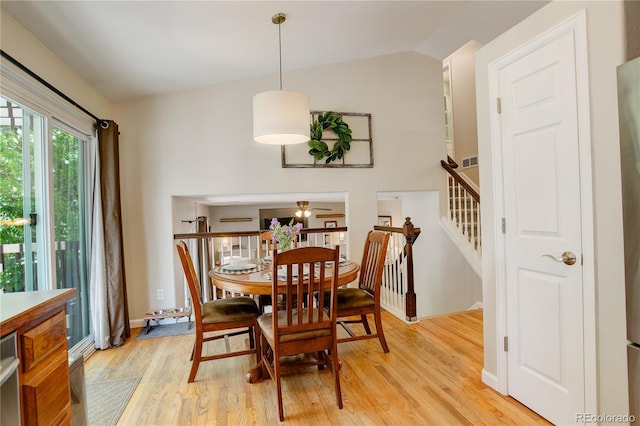 12671 Meadow Bridge Way, Parker, CO 80134 - dining room with light wood-style floors, ceiling fan, and lofted ceiling