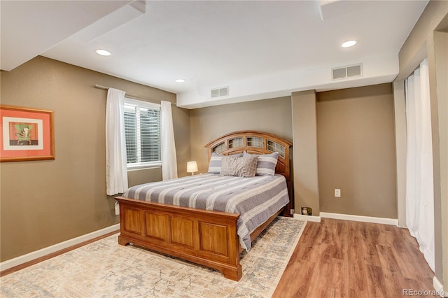 12671 Meadow Bridge Way, Parker, CO 80134 - bedroom with light wood-type flooring, recessed lighting, and baseboards