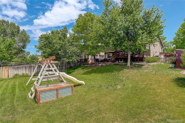 12671 Meadow Bridge Way, Parker, CO 80134 - view of yard featuring a deck