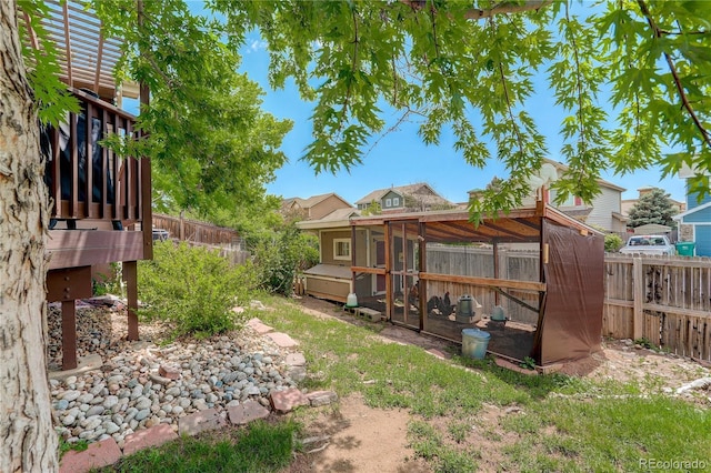 12671 Meadow Bridge Way, Parker, CO 80134 - fenced backyard featuring exterior structure and an outdoor structure