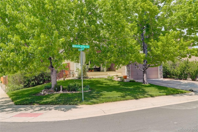 12671 Meadow Bridge Way, Parker, CO 80134 - view of front of house featuring driveway and a front lawn