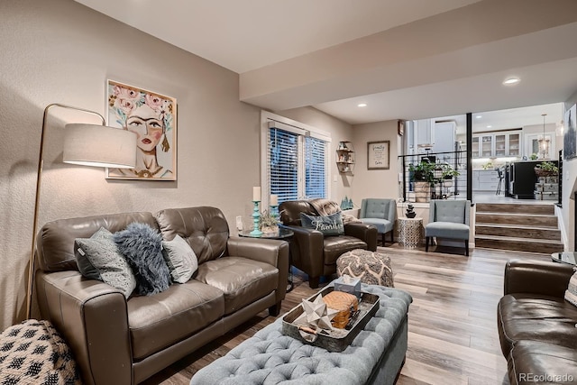 living area featuring recessed lighting and wood finished floors
