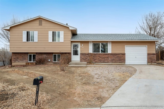 tri-level home featuring a garage