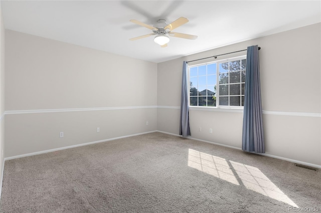 9898 Tourmaline Ct, Parker, CO 80134 - spare room with a ceiling fan, carpet flooring, and baseboards