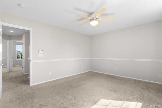 9898 Tourmaline Ct, Parker, CO 80134 - carpeted spare room with a ceiling fan, baseboards, and a smoke detector