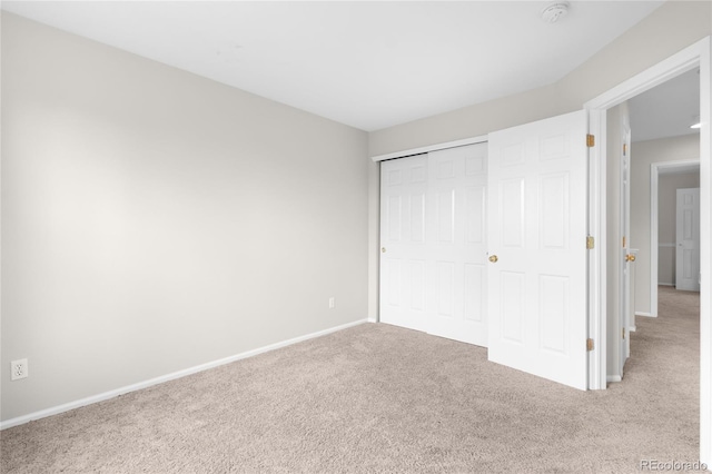 9898 Tourmaline Ct, Parker, CO 80134 - unfurnished bedroom with carpet flooring, baseboards, and a closet