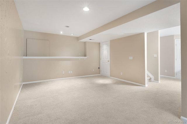 9898 Tourmaline Ct, Parker, CO 80134 - finished basement with carpet floors, baseboards, recessed lighting, and stairs