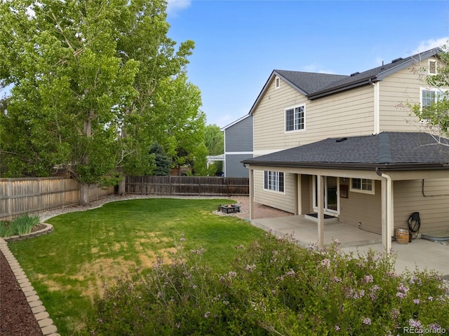9898 Tourmaline Ct, Parker, CO 80134 - view of yard featuring a patio area and a fire pit