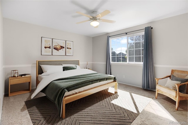 9898 Tourmaline Ct, Parker, CO 80134 - bedroom with carpet floors, baseboards, and ceiling fan