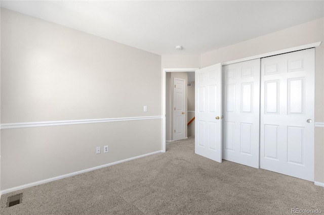 9898 Tourmaline Ct, Parker, CO 80134 - unfurnished bedroom featuring carpet floors, a closet, and baseboards