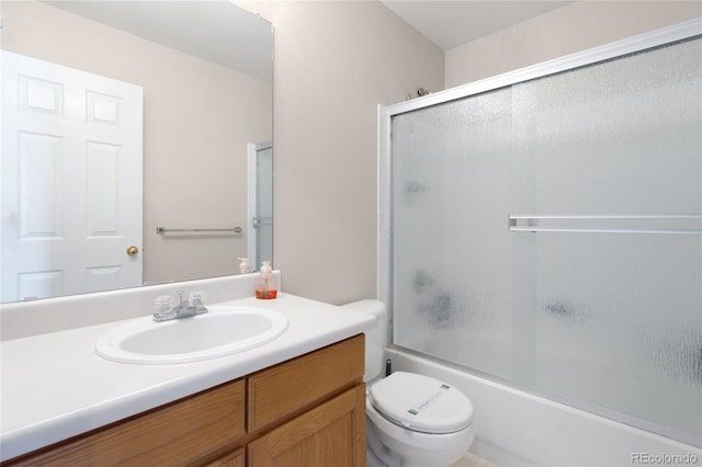 9898 Tourmaline Ct, Parker, CO 80134 - full bathroom with vanity, toilet, and bath / shower combo with glass door