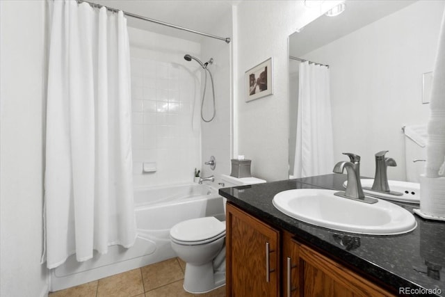 1761 S Buchanan Cir, Aurora, CO 80018 - bathroom featuring tile patterned flooring, toilet, shower / bath combo with shower curtain, and vanity