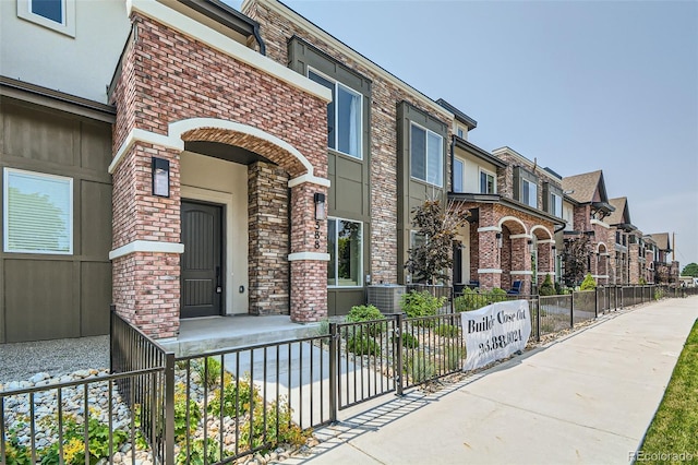 entrance to property with central AC unit