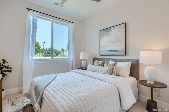 carpeted bedroom with ceiling fan