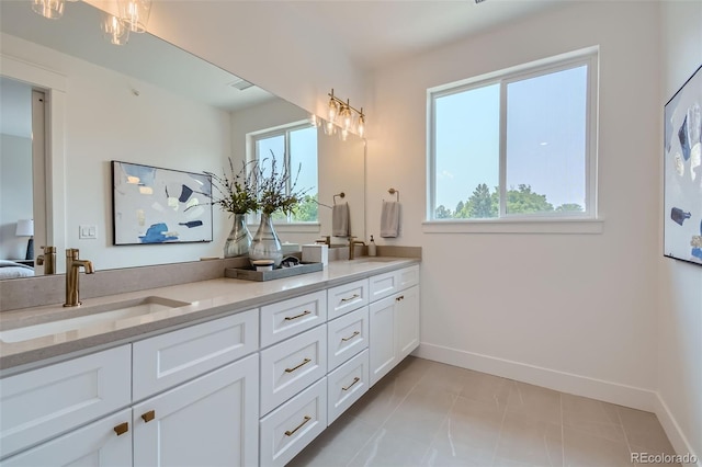 bathroom featuring vanity and tile patterned floors