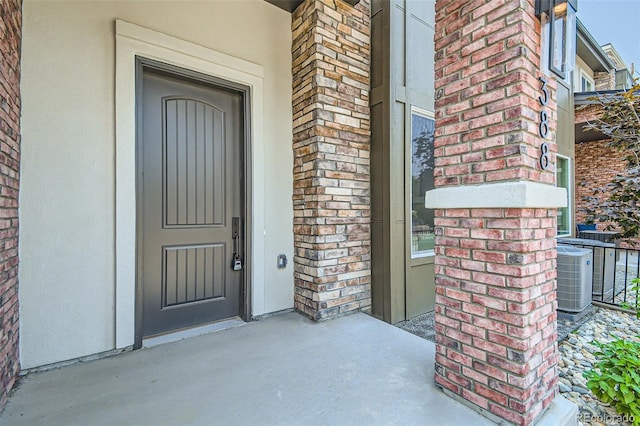 property entrance with central air condition unit