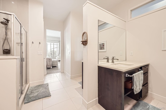 19 S 45th Ave, Brighton, CO 80601 - full bath featuring connected bathroom, baseboards, tile patterned floors, and a stall shower