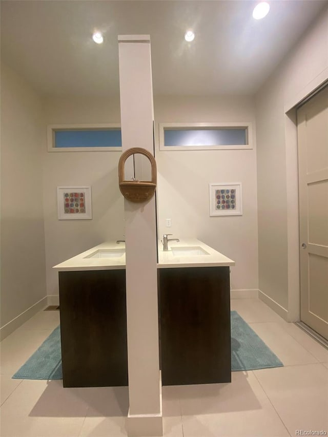 19 S 45th Ave, Brighton, CO 80601 - interior space featuring vanity, baseboards, tile patterned floors, and recessed lighting