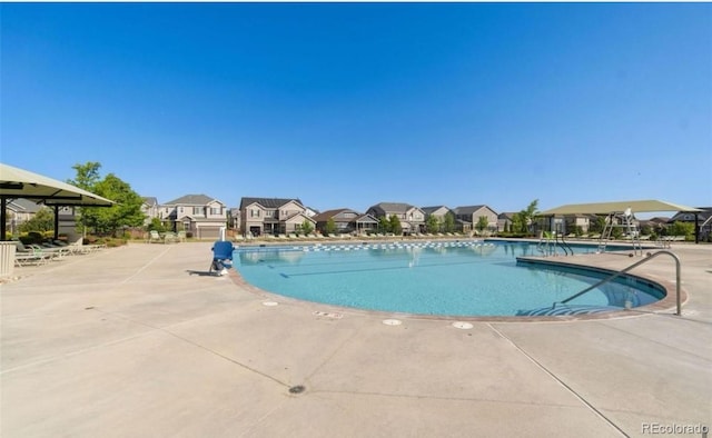 19 S 45th Ave, Brighton, CO 80601 - community pool with a residential view and a patio