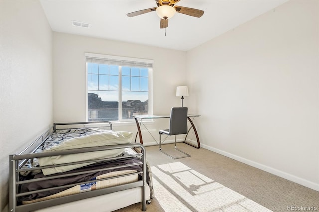 carpeted bedroom featuring ceiling fan