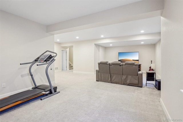 exercise area with light colored carpet