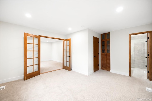655 Cree Cir, Boulder, CO 80303 - unfurnished bedroom with french doors, recessed lighting, carpet floors, and ensuite bath