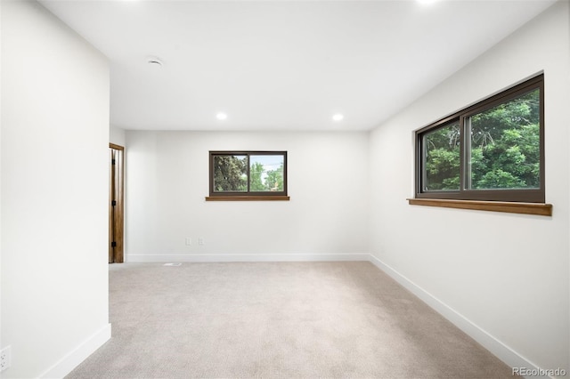 655 Cree Cir, Boulder, CO 80303 - empty room featuring plenty of natural light, light colored carpet, and recessed lighting