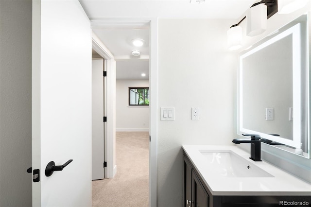 655 Cree Cir, Boulder, CO 80303 - bathroom with vanity and baseboards