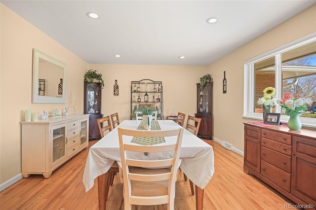 dining room with light wood-type flooring