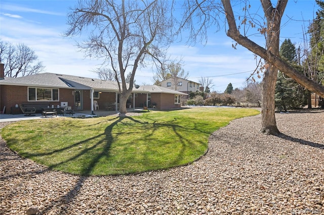 view of yard featuring a patio