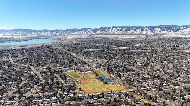 bird's eye view featuring a water and mountain view