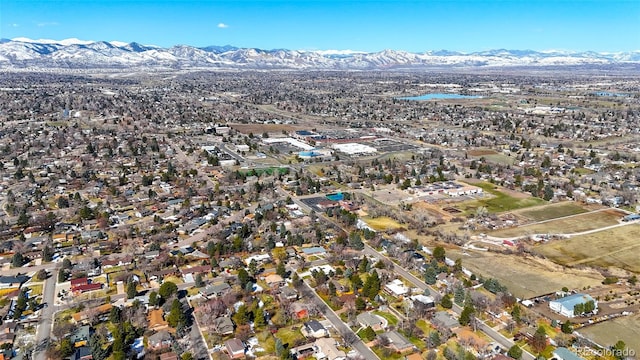 birds eye view of property featuring a mountain view