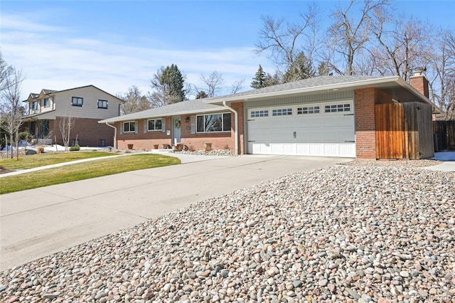 ranch-style home featuring a garage