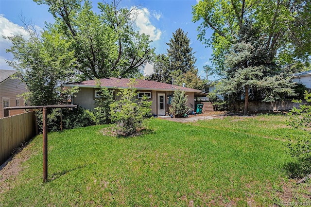 3715 Manchester St, Colorado Springs, CO 80907 - back of property featuring stucco siding