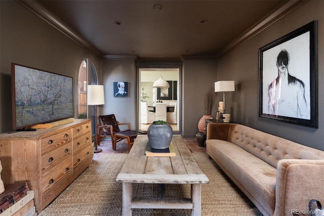 living room with ornamental molding