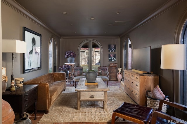 living area with ornamental molding and arched walkways