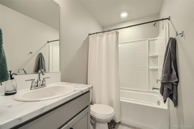 full bathroom with shower / bath combination with curtain, vanity, and toilet